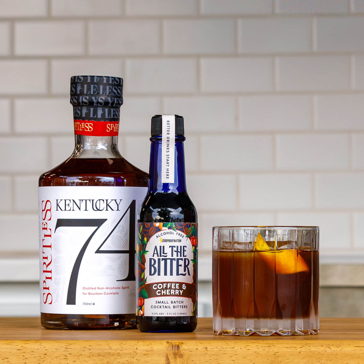 A non-alcoholic Coffee Old Fashioned mocktail made with Kentucky 74 and All The Bitter non-alcoholic bitters.