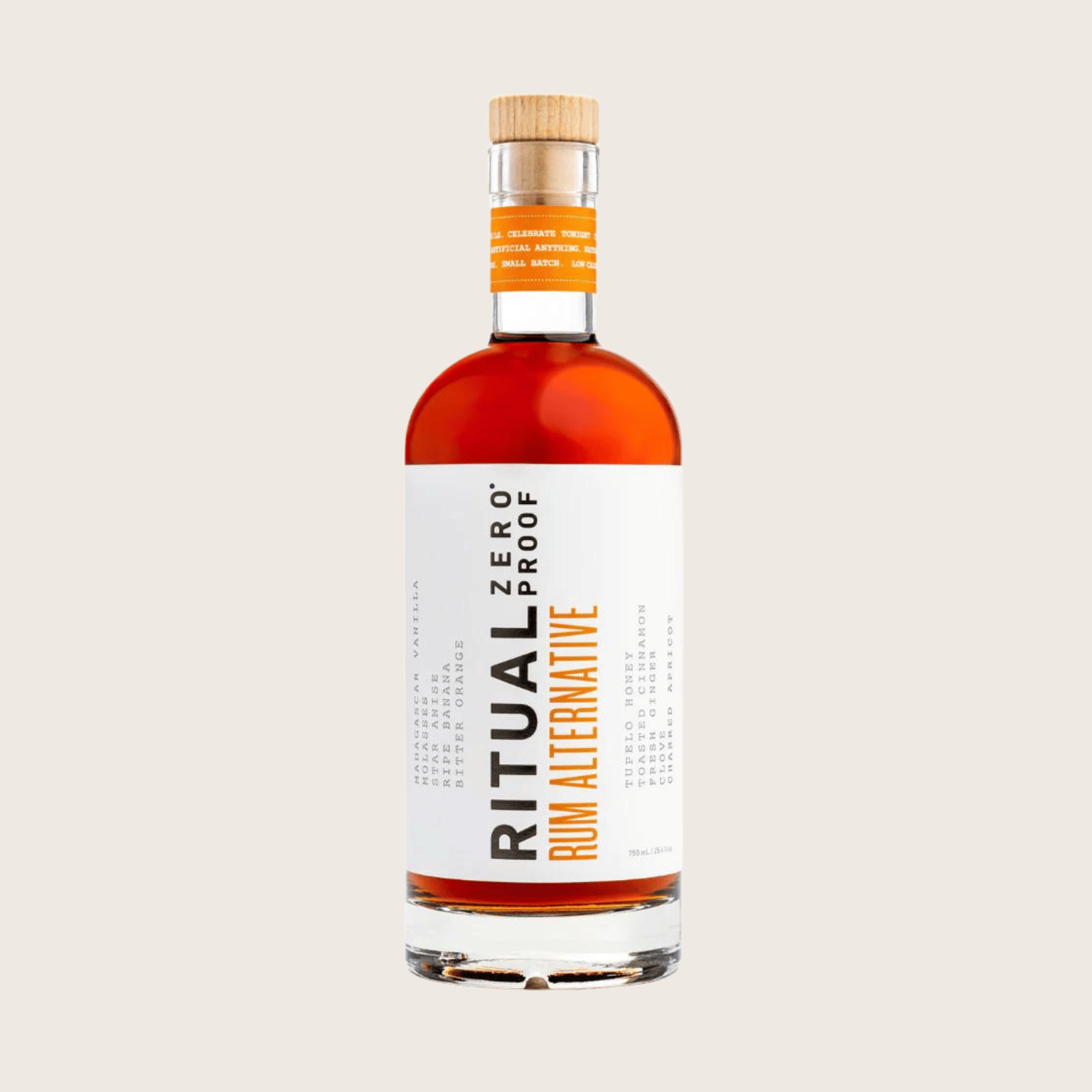Bottle of Ritual Zero Proof Rum Alternative on a beige background